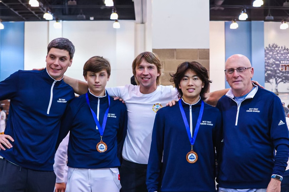 Coach Nikola Kovalev, Coach Artem, Coach Gherman taken pictures with two boy saber fencers after a regional tournament with medals in Southern California