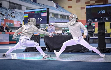 Connor liang fencing at a international saber fencing tournament 